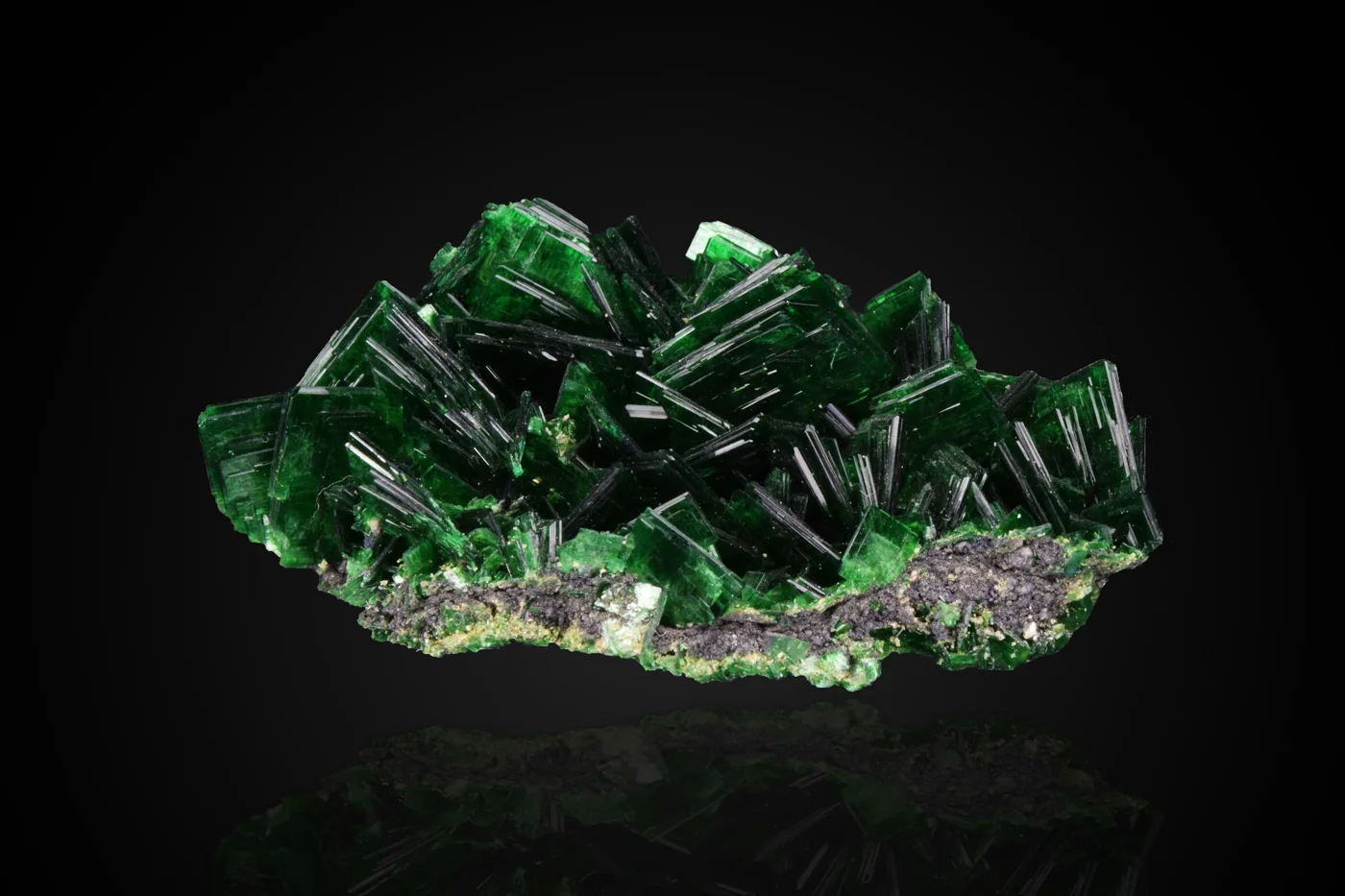 A green and white crystal fragment